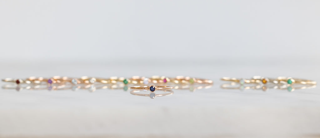 yellow gold emerald birthstone stacking ring