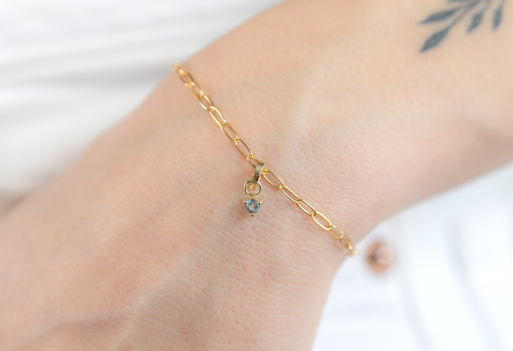 10k Yellow Gold Aquamarine Birthstone Charm on Charm Bracelet on Model