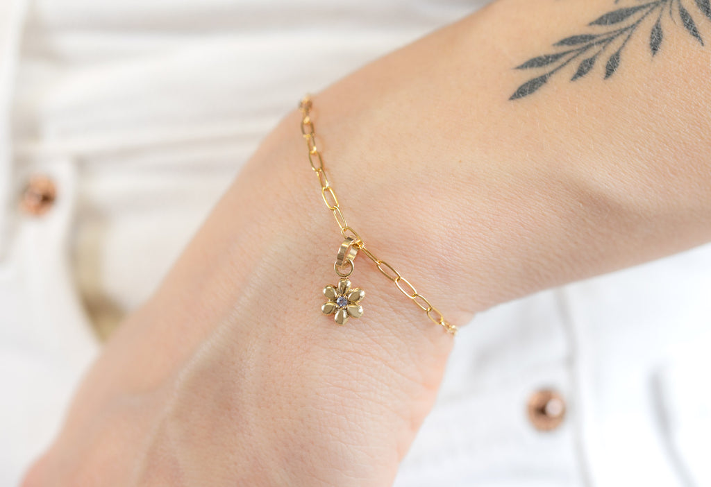 10k Yellow Gold Flower Charm on Charm Bracelet on Model