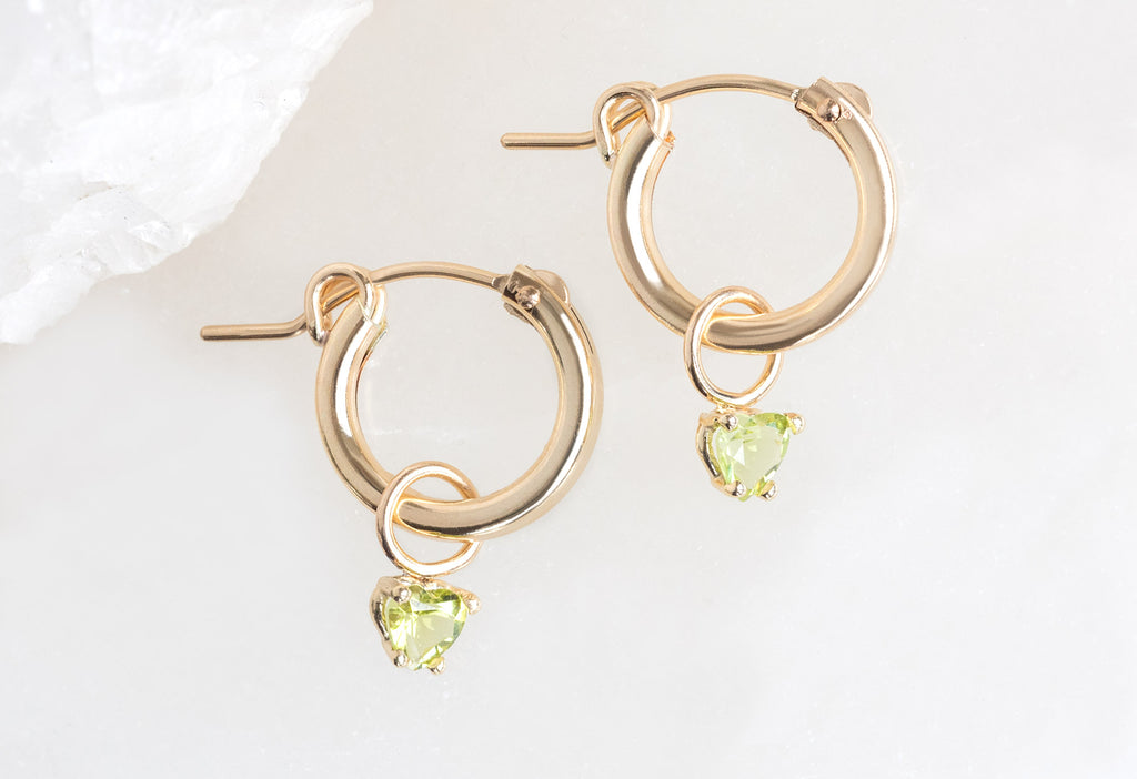 Peridot Heart Hoops Laying Down