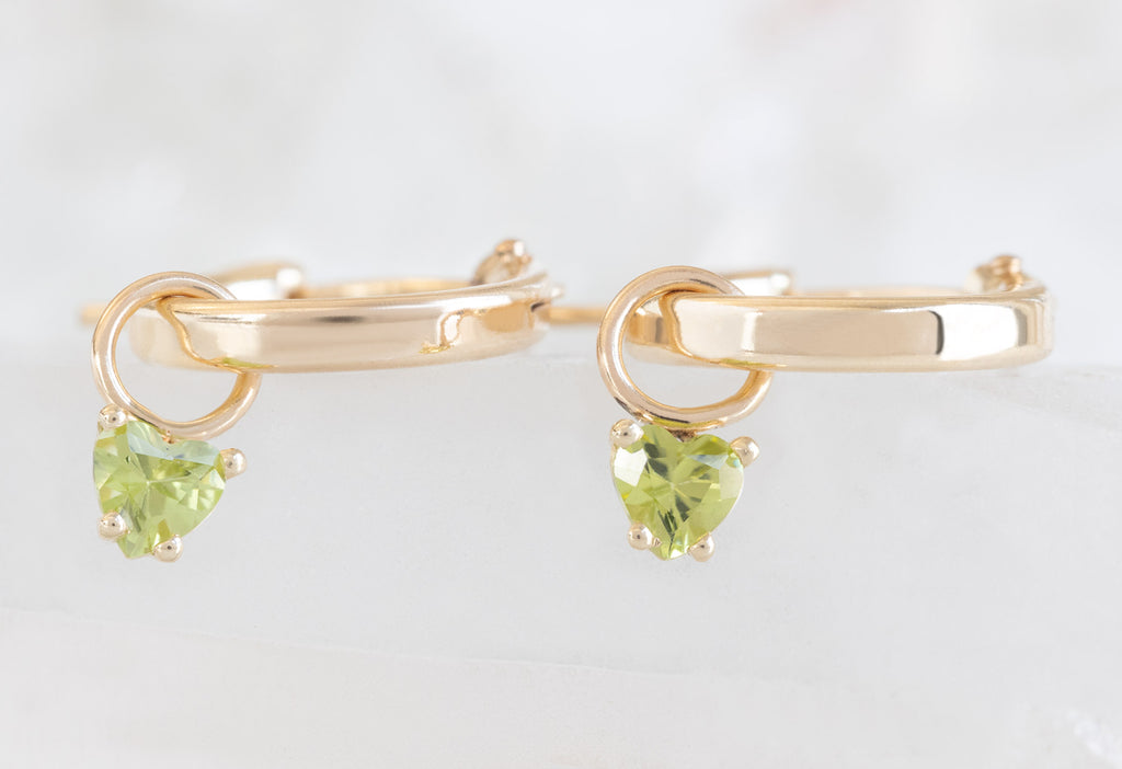 Side View of Yellow Gold Peridot Heart Hoops