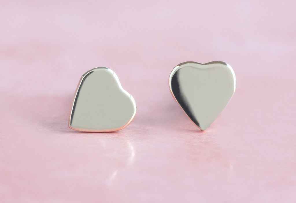 10k Yellow Gold Sweetheart Stud Earrings on Pink Background