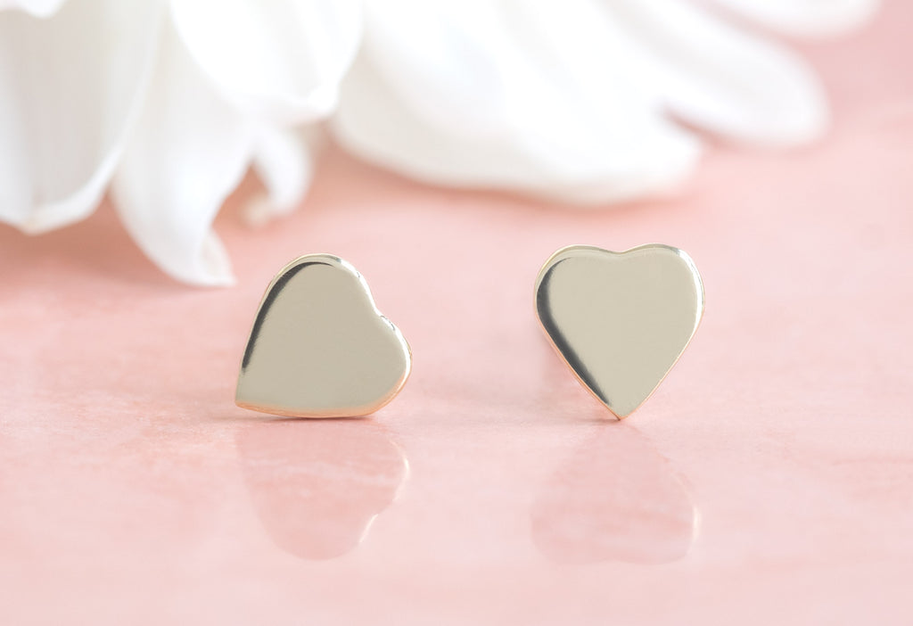 10k Yellow Gold Sweetheart Stud Earrings on  on Pink Background