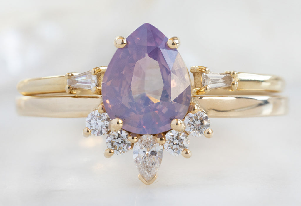 The Aster Ring with a Pear-Cut Orchid Sapphire with Open Cuff Baguette Stacking Band