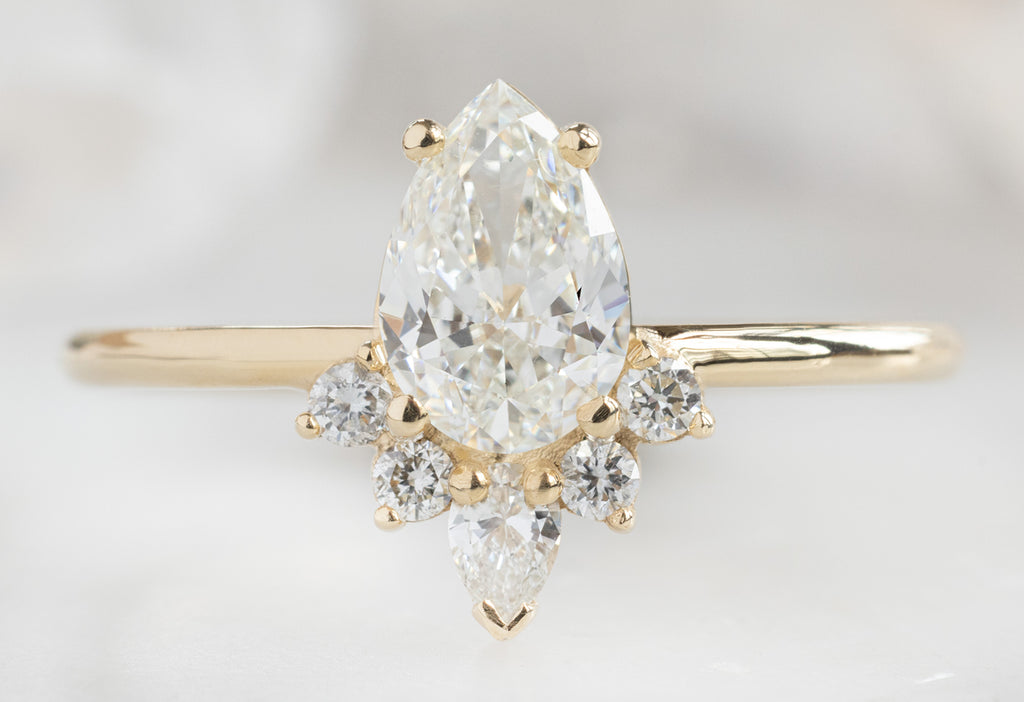 The Aster Ring with a Pear-Cut White Diamond