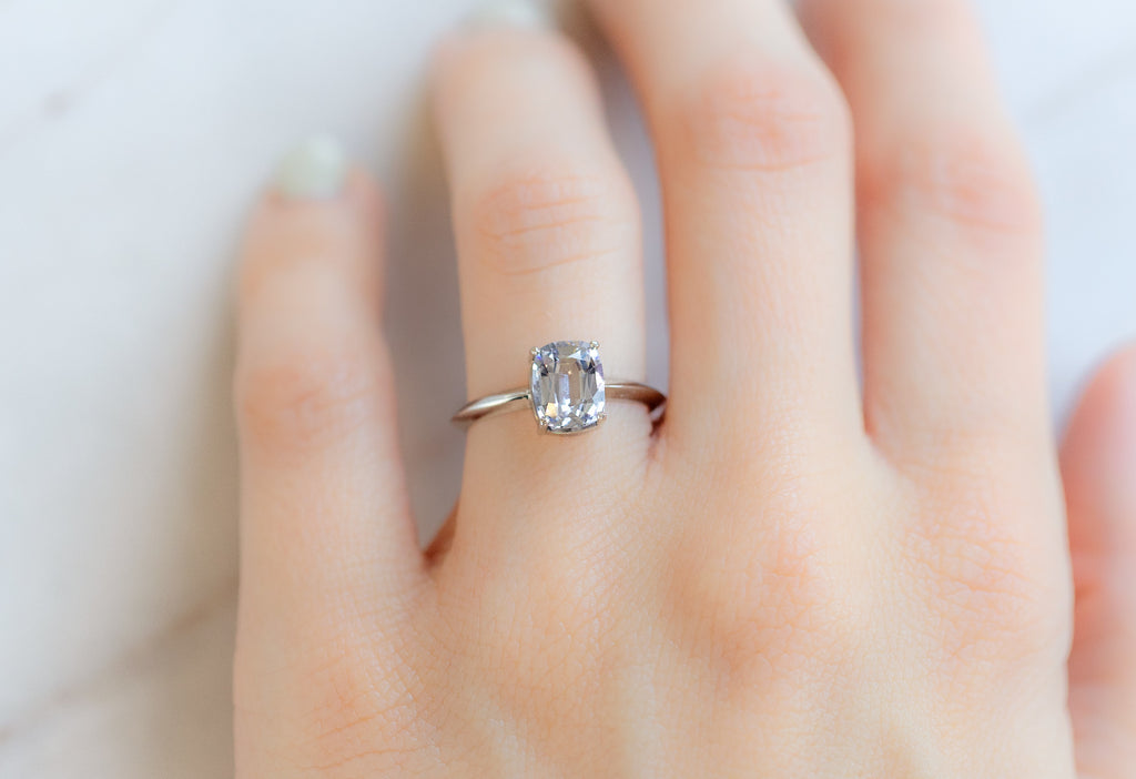 The Bryn Ring with a Cushion-Cut Tanzanite on Model