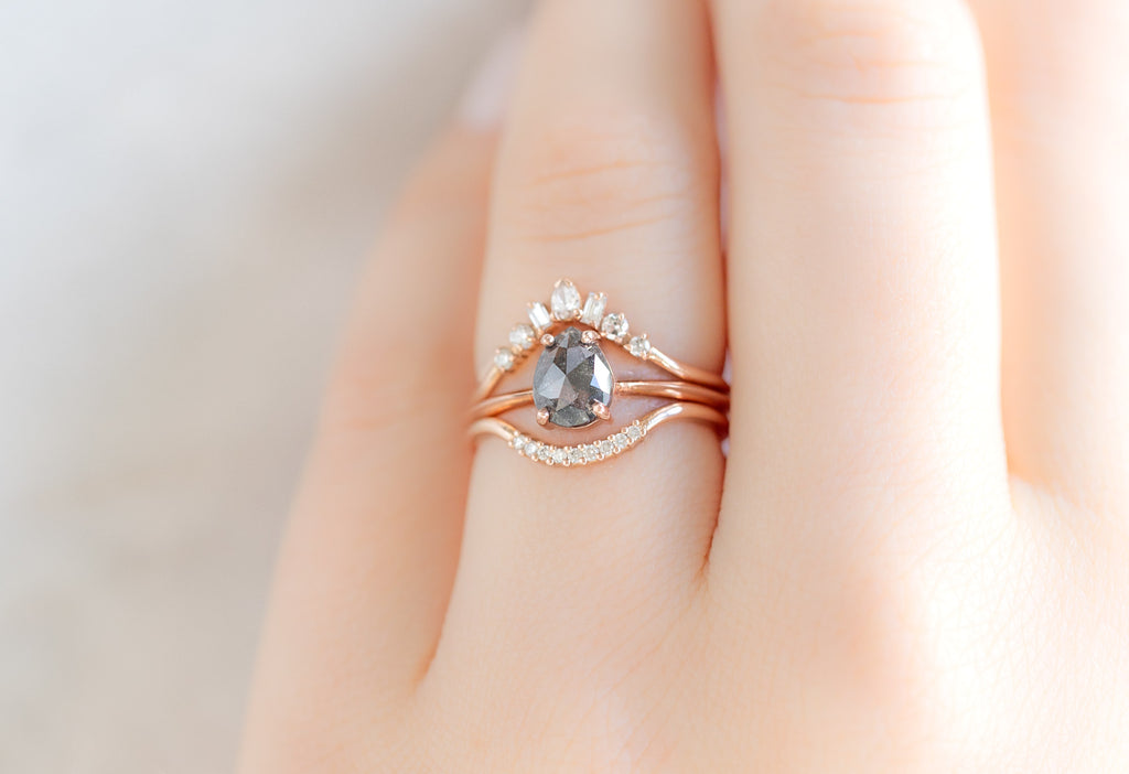 The Bryn Ring with a Rose-Cut Black Diamond with Whtie Diamond Stacking Bands on Model