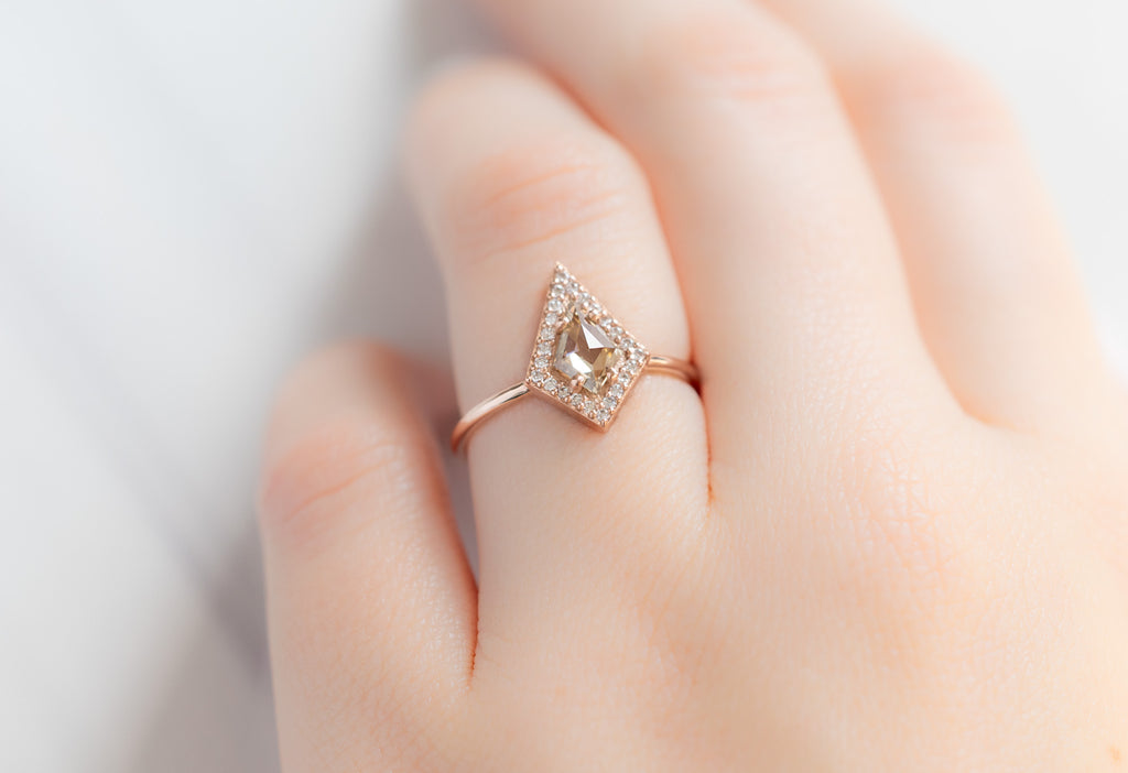 The Dahlia Ring with a Kite-Shaped Champagne Diamond on Model