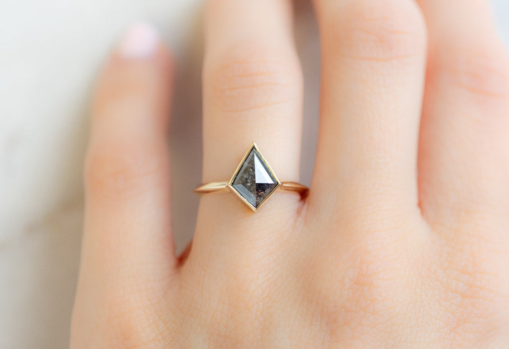 The Hazel Ring with a Kite-Shaped Black Diamond on Model