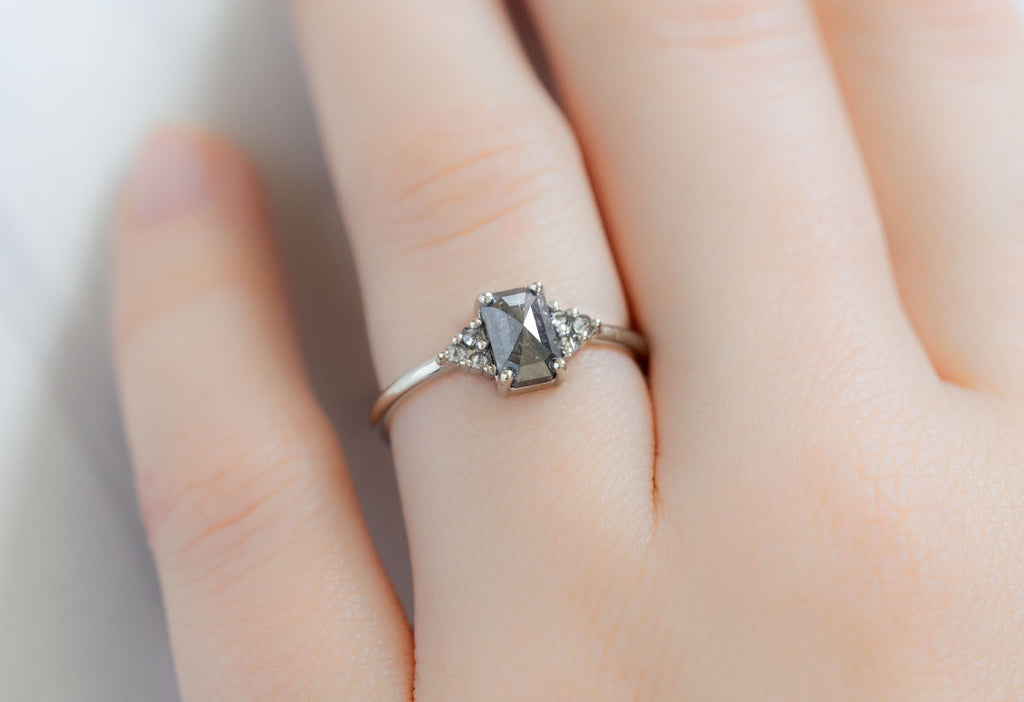 The Ivy Ring with an Emerald-Cut Black Diamond on Model