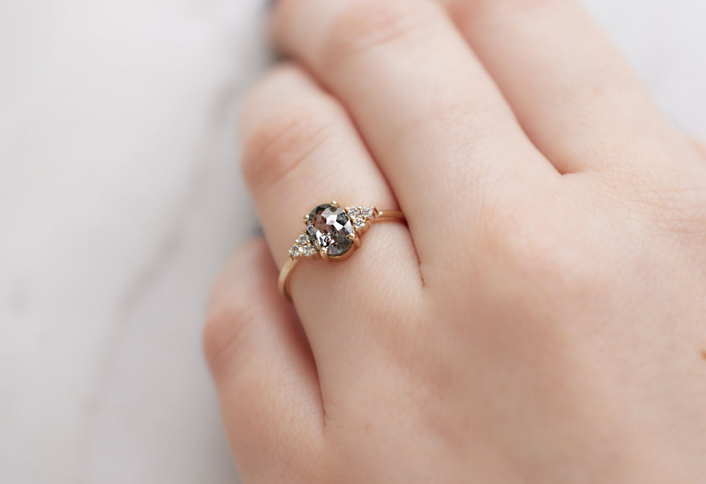 The Ivy Ring with an Oval-Cut Salt and Pepper Diamond on Model