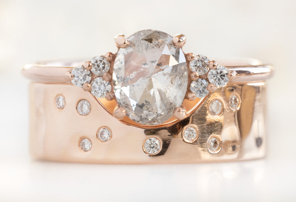 The Ivy Ring with an Oval-Cut Salt and Pepper Diamond with the Constellation Cut-Out Stacking Band