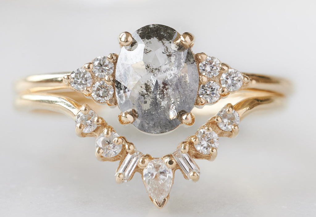 The Ivy Ring with an Oval-Cut Salt and Pepper Diamond with Geometric White Diamond Sunburst Stacking Band