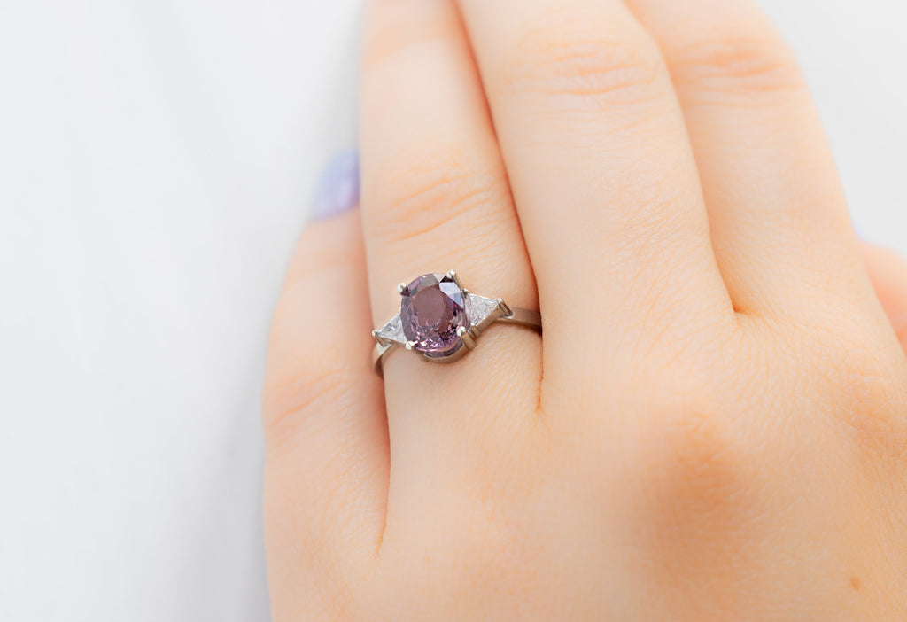 The Jade Ring with an Oval-Cut Magenta Spinel on Model