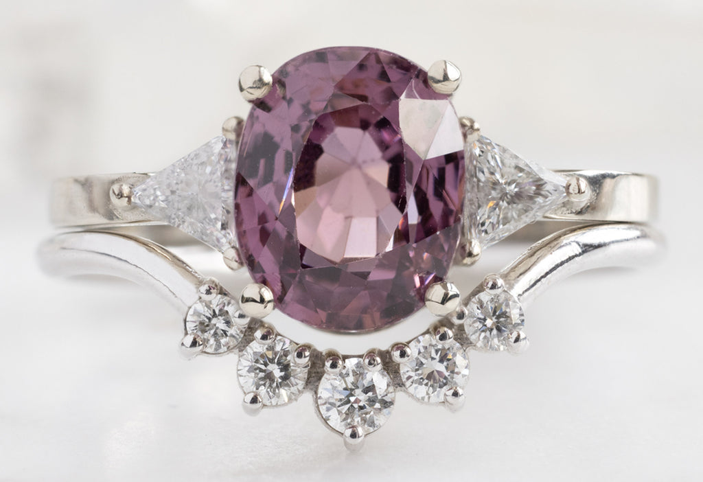 The Jade Ring with an Oval-Cut Magenta Spinel with the White Diamond Sunburst Stacking Band