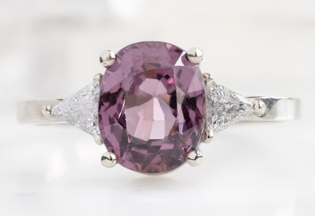 The Jade Ring with an Oval-Cut Magenta Spinel