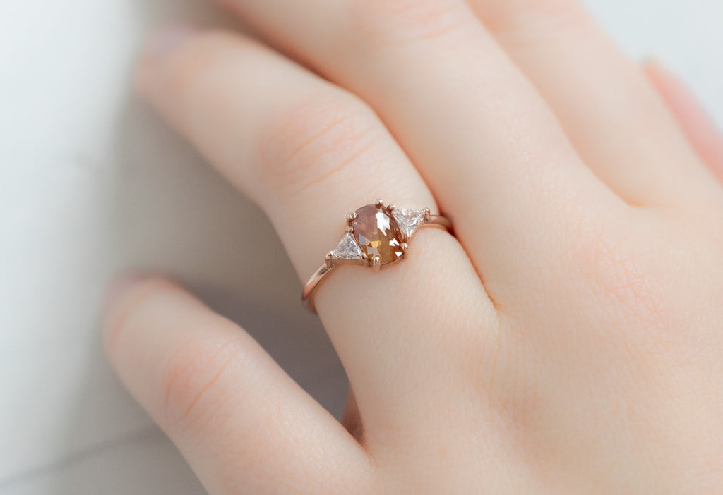 The Jade Ring with an Oval-Cut Red Diamond on Model