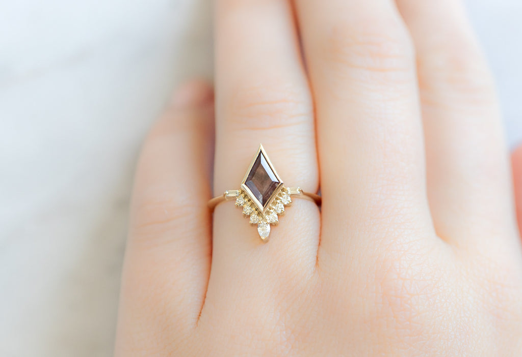 The Posy Ring with a Kite-Shaped Mauve Sapphire on Model