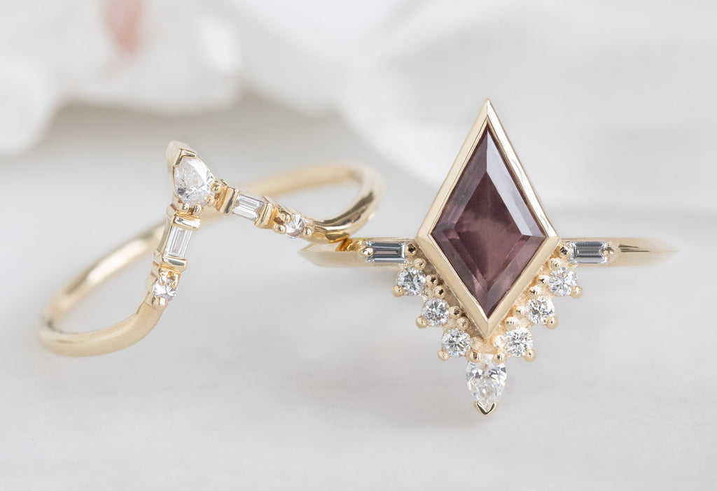 The Posy Ring with a Kite-Shaped Mauve Sapphire with Yellow Gold White Diamond Tiara Stacking Band