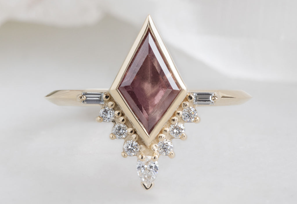 The Posy Ring with a Kite-Shaped Mauve Sapphire