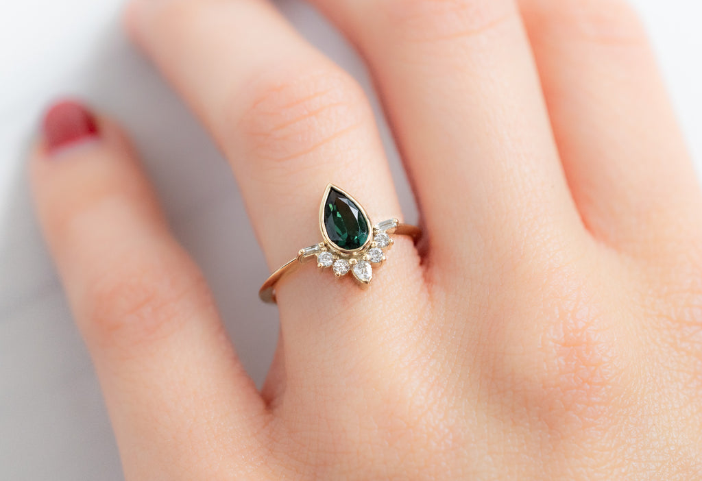 The Posy Ring with a Pear-Cut Tourmaline on Model