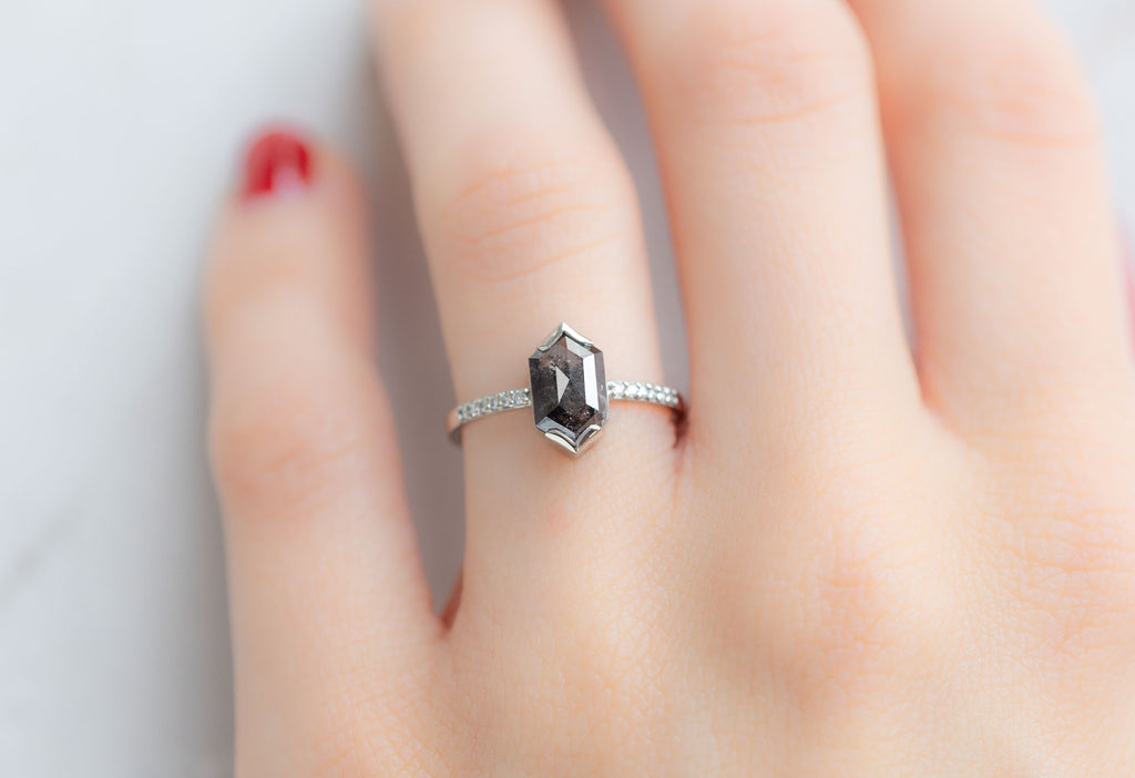 The Willow Ring with a Black Hexagon Diamond on Model