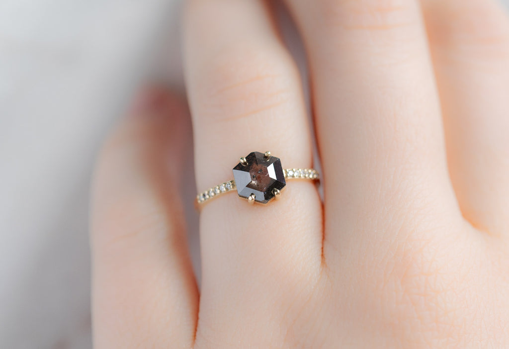 The Willow Ring with a Black Hexagon Diamond on Model