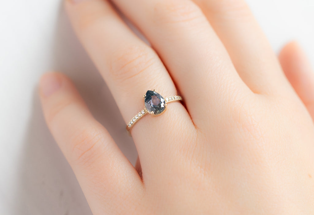 The Willow Ring with a Pear-Cut Montana Sapphire on Model