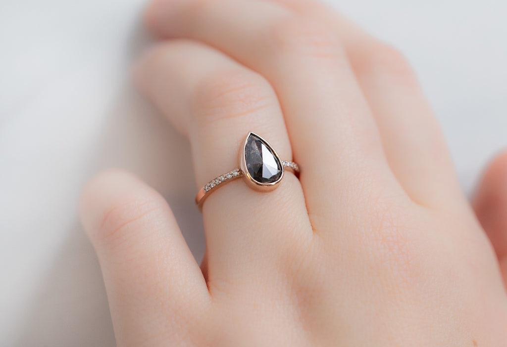 The Willow Ring with a Rose-Cut Black Diamond on Model