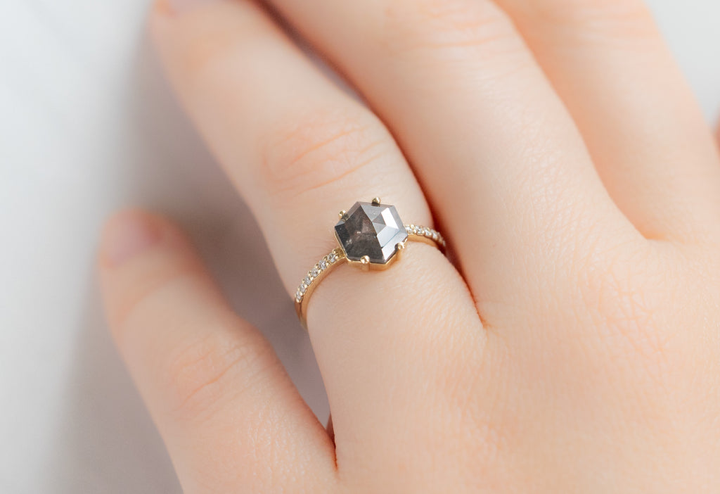 The Willow Ring with a Salt and Pepper Hexagon Diamond on Model