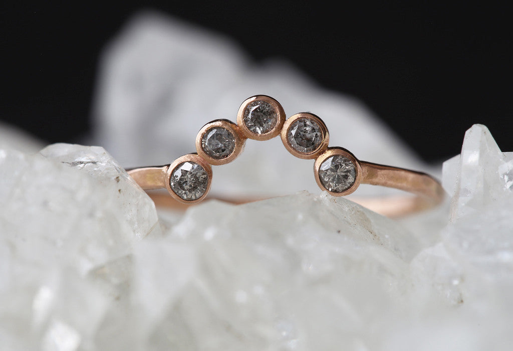 Rose Gold Diamond Bezel Arc Ring on white crystal