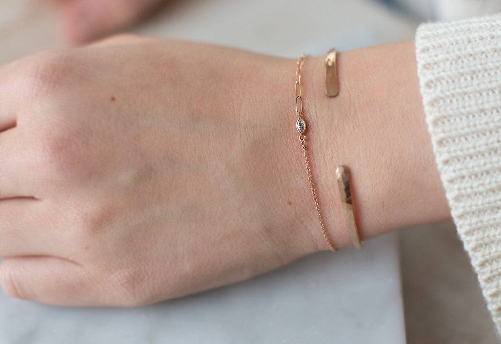 Asymmetrical Diamond Eye Bracelet Layered on Model