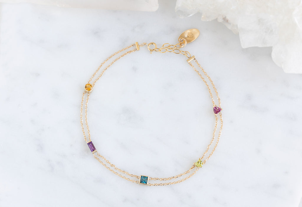 Candy Gemstone Bracelet on White Marble TIle