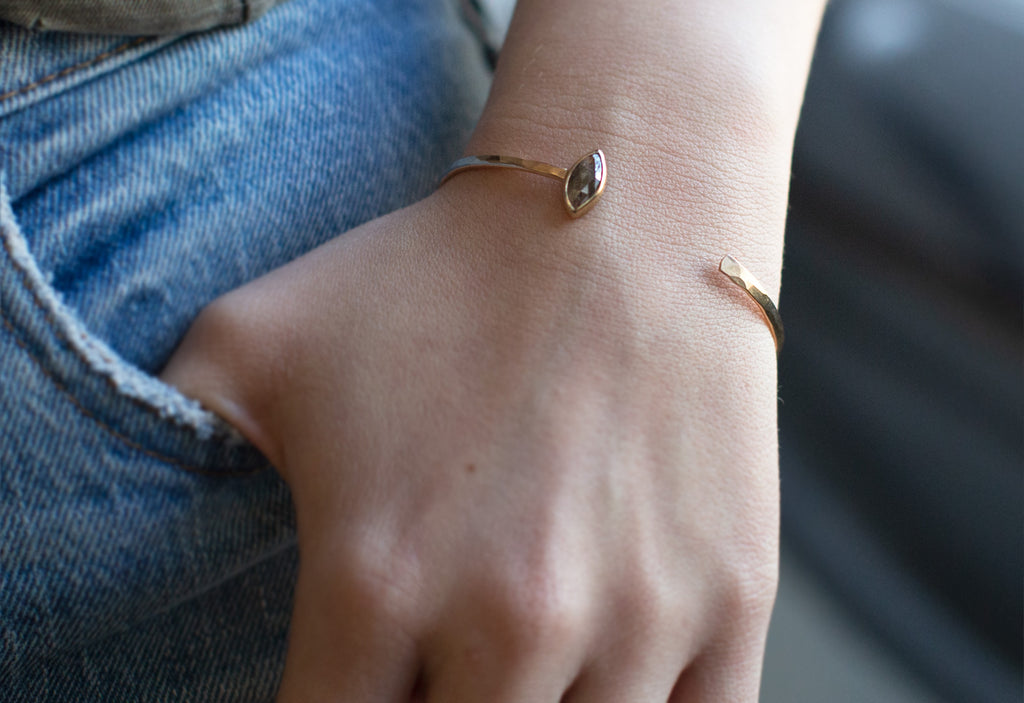 One of A Kind Diamond Cuff Bracelet on Model with hand in jeans pocket