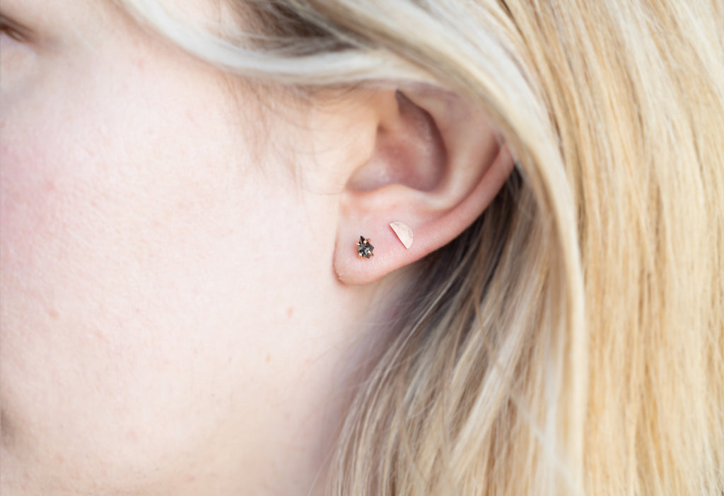 Geometric Black Diamond Stud Earrings Stacked on Model