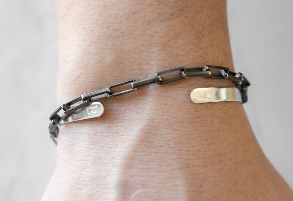 Men's Drawn Cable Chain Bracelet Layered on Model