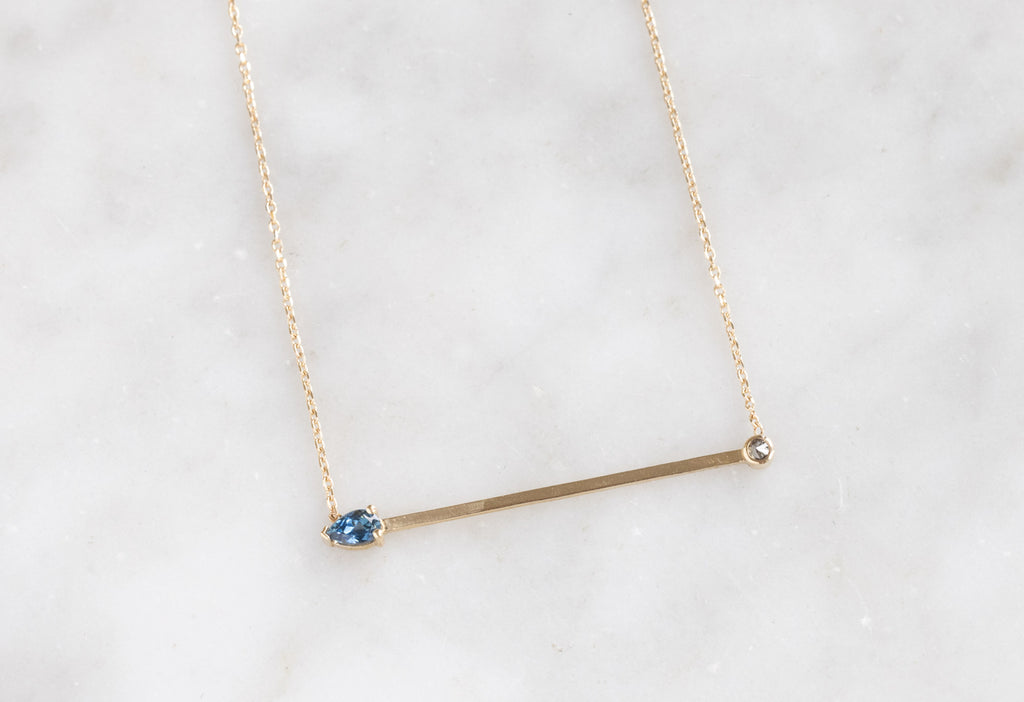 Montana Sapphire + Diamond Necklace on Marble