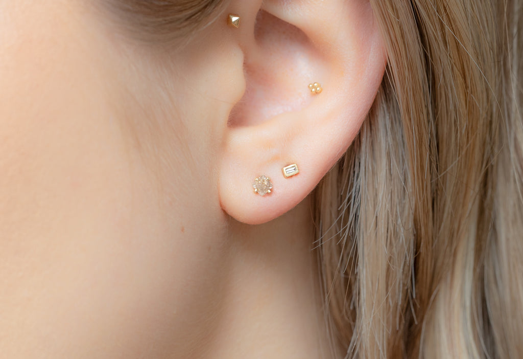 Rough Diamond Stud Earrings Stacked on Model