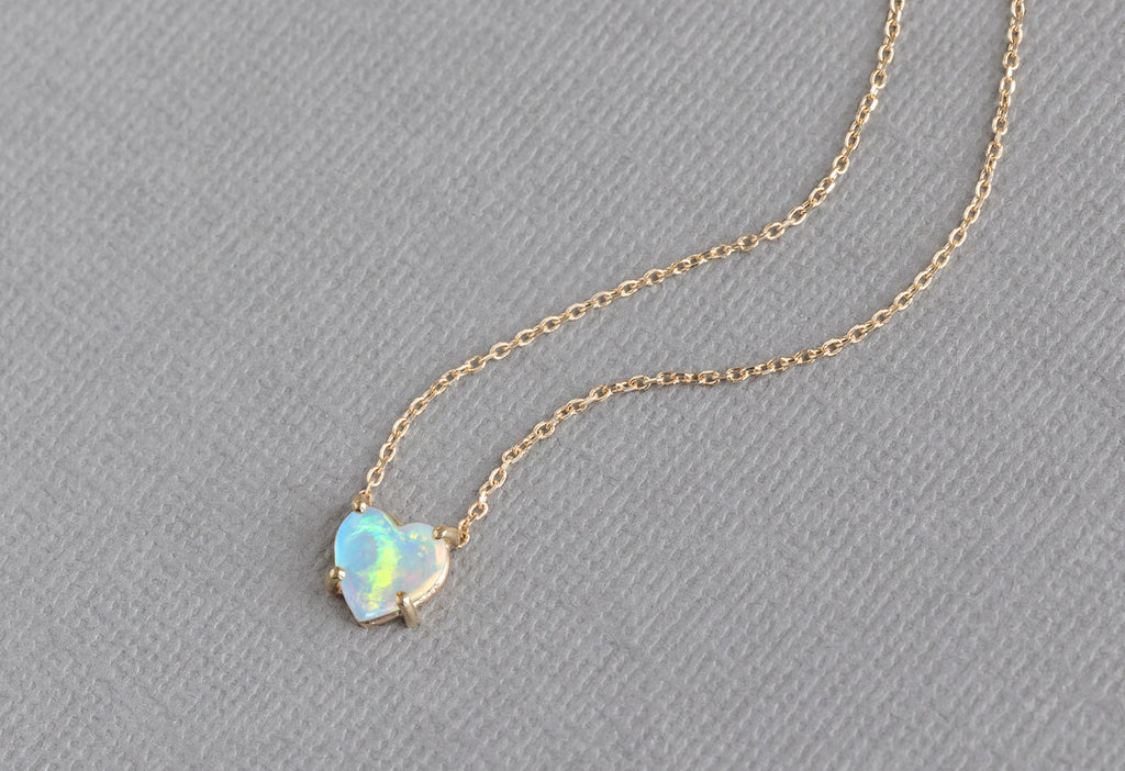 Sweetheart Opal Necklace on Grey Textured Paper