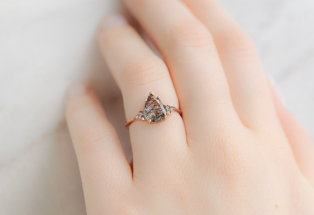 The Ivy Ring with a Pear-Cut Tourmaline in Quartz on Model