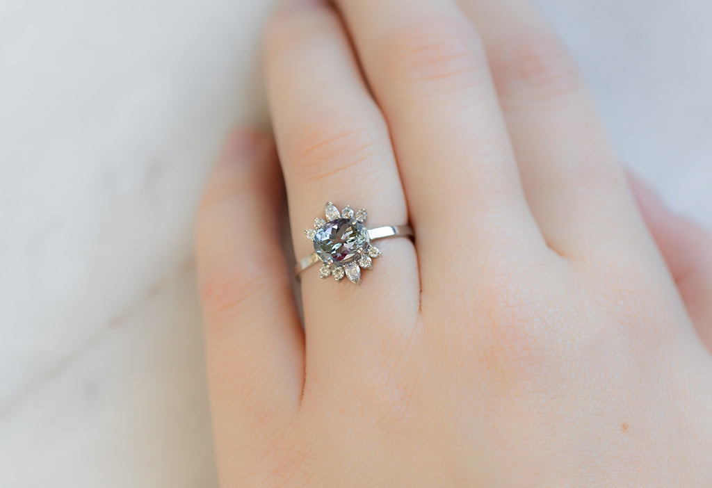 The Lotus Ring with an Oval-Cut Tanzanite on Model