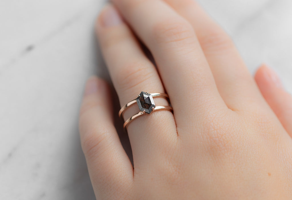 The Poppy Ring with a Black Hexagon Diamond on Model