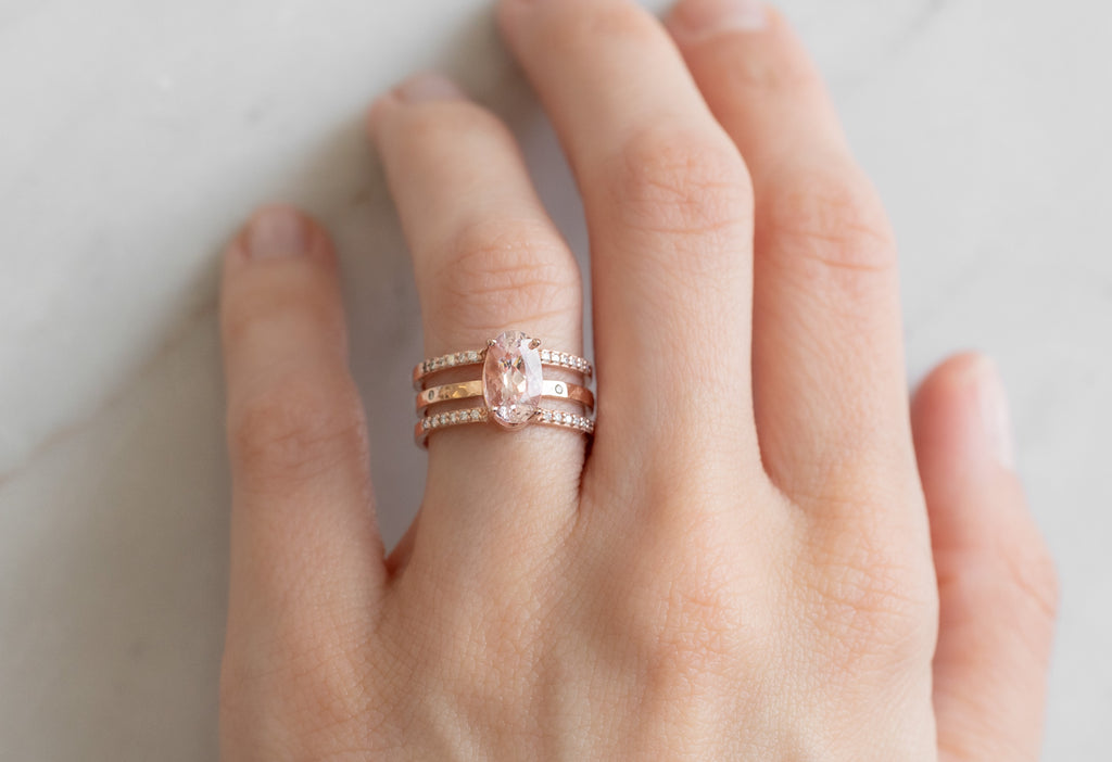 The Poppy Ring with an Oval Cut Morganite Ring with Stacking Band on Model