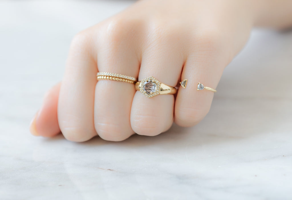 The Signet Ring with a Tourmaline in Quartz Hexagon Stacked on Model