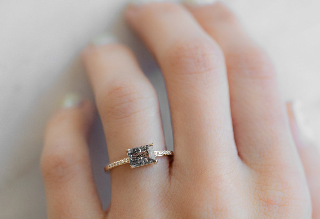 The Willow Ring with an Emerald-Cut Tourmaline In Quartz on Model