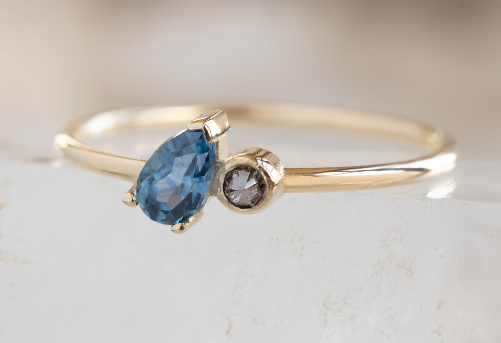 The You & Me Ring with a Montana Sapphire + Salt and Pepper Diamond