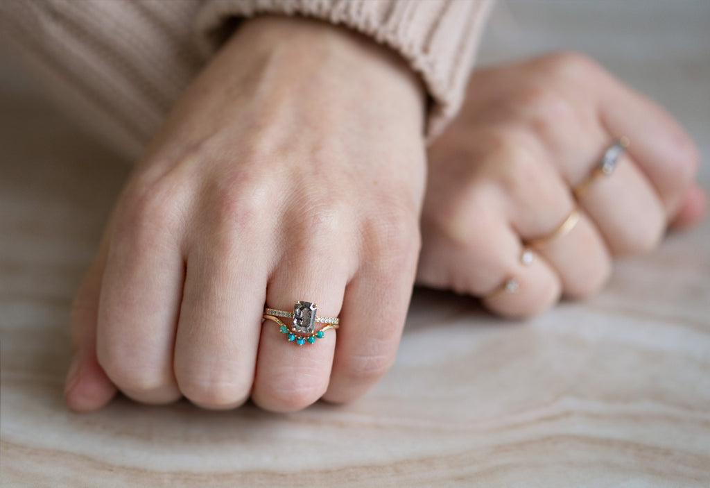 Turquoise Sunburst Wedding Band Stacked with Engagement Ring on Model