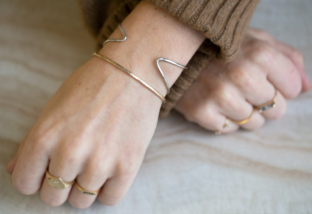 Sterling Silver Arrow Cuff Bracelet Stacked on Model