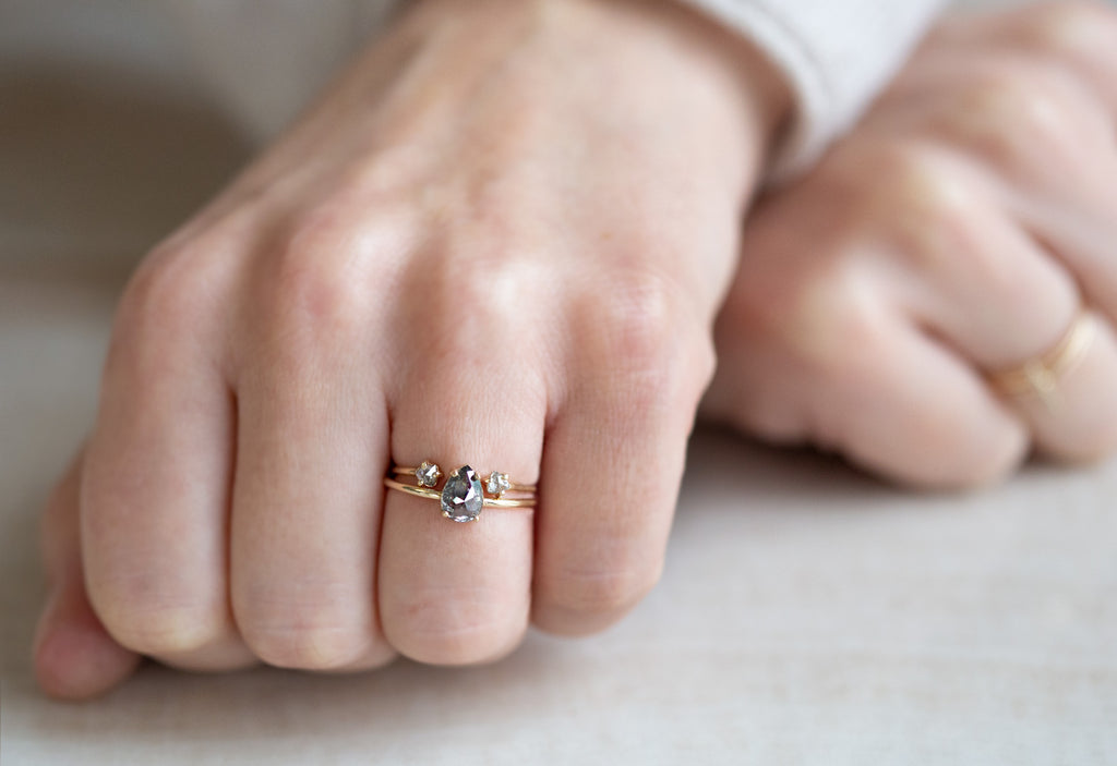 Open Cuff Diamond Trillion Ring Stacked with Salt and Pepper Diamond Engagement Ring on Model